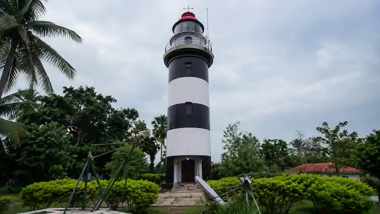 Black and white Dariapur Lighthouse near Bankiput Sea Beach.