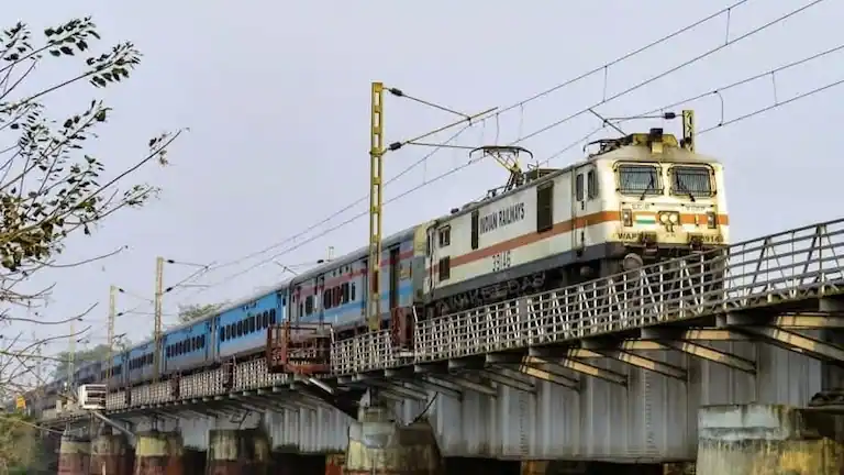 Indian Railways train crossing a bridge on the Howrah to Balasore route for Chandipur