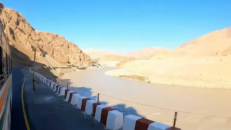 View of the Indus River and mountains from the window of the Leh to Kargil Bus Service.