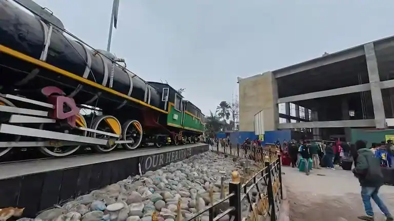 Heritage train display outside NJP station on the Kolkata to Sikkim route.
