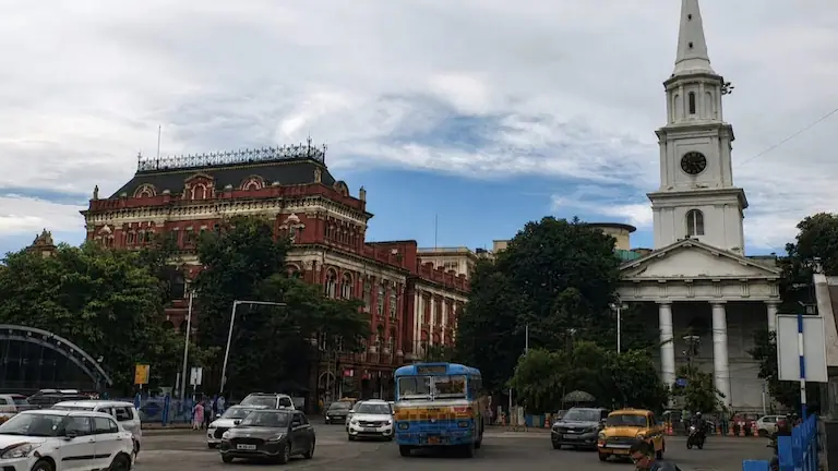 A view of the colonial Writers' Building and St. Andrew's Church spire in BBD Bagh during Kolkata Heritage Walks.