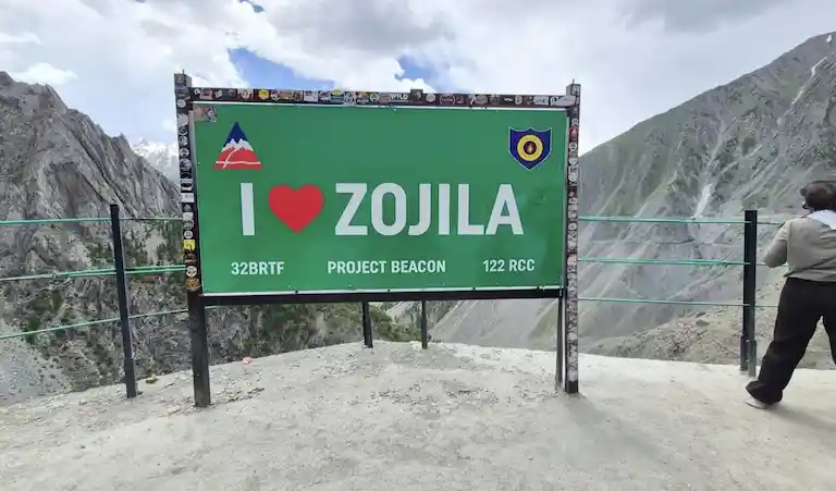 Green I Love Zojila signboard erected by BRO at Zoji La Pass.