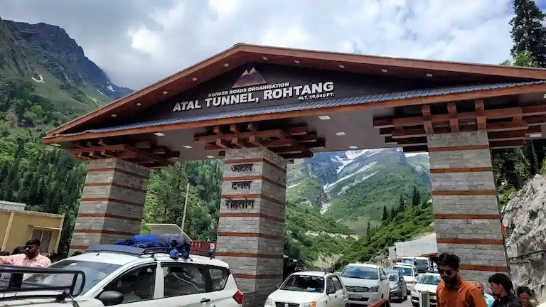 Tourist vehicles waiting at the Atal Tunnel Rohtang entrance gate built by BRO