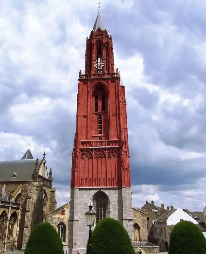 The towering red Sint Janskerk church in Maastricht.