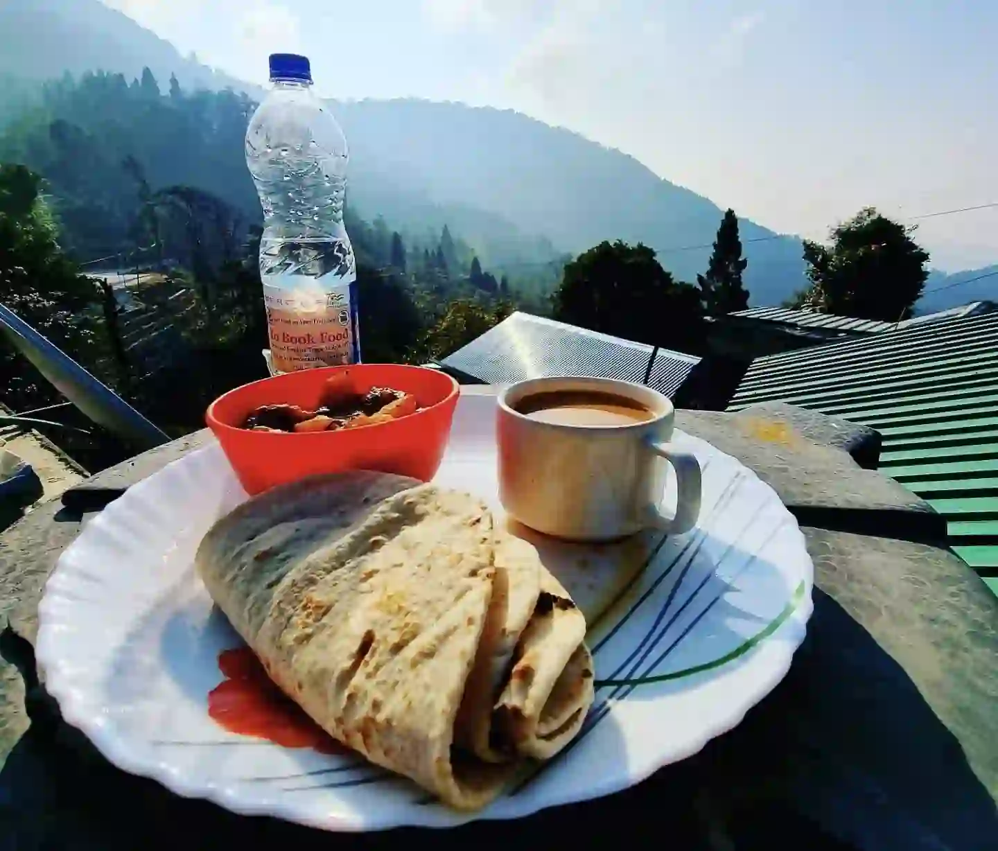 Simple home-cooked breakfast and tea served at a village homestay in Tinchuley.