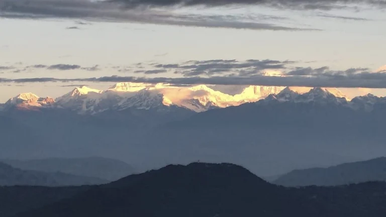 Clear morning view of the Kanchenjunga mountain range from Tinchuley.