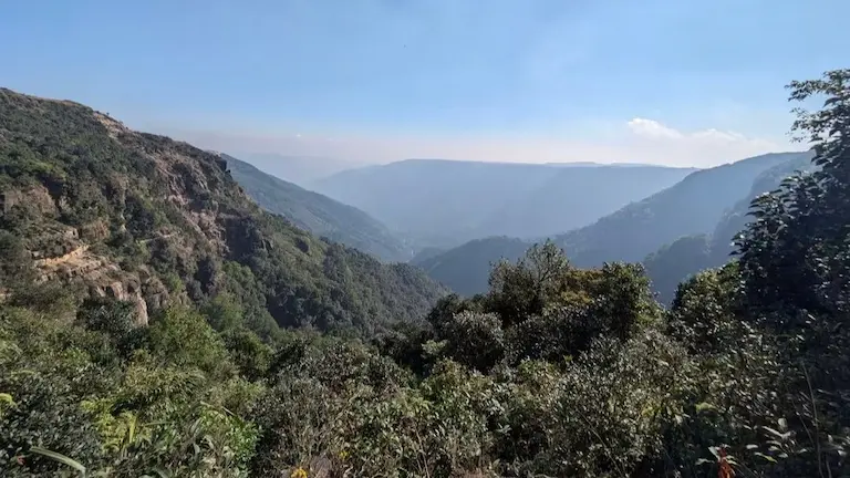 Deep forested canyons and steep hills in Meghalaya